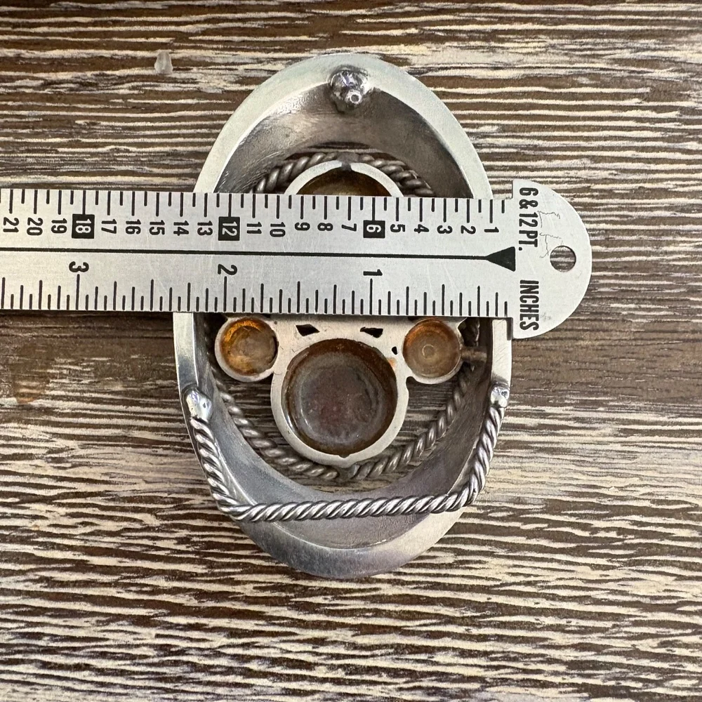 Vintage custom belt buckle featuring Buffalo nickels and brass bullet casings